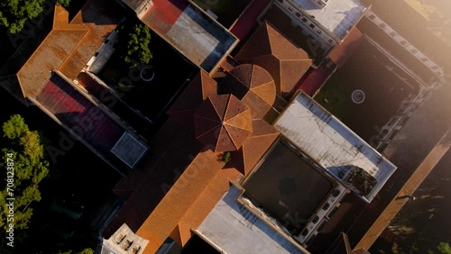 4k video, aerial aerial view of old church at sunset