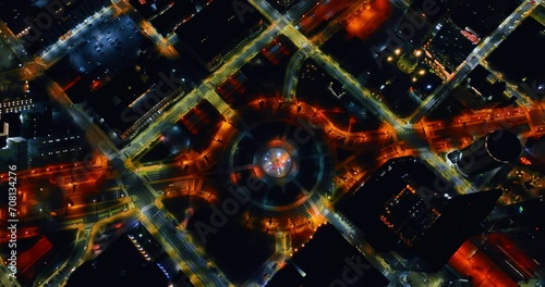 Circling above the Logan Square in Philadelphia, Pennsylvania, USA. Drone footage above the night city with multiple lights. photo