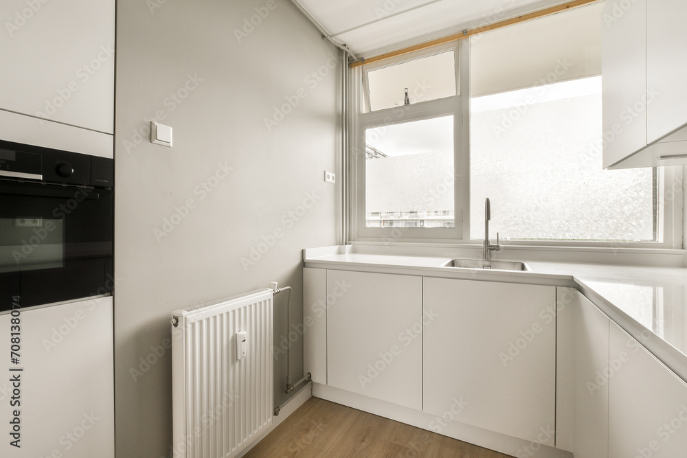 Modern minimalist kitchen interior with natural light Modern minimalist kitchen interior with natural light