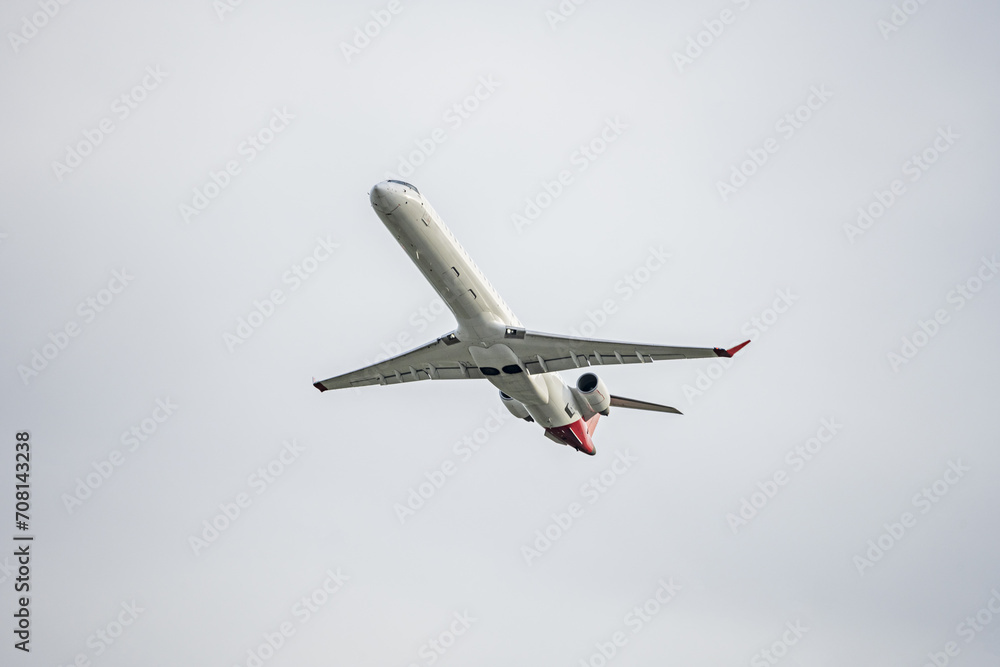 Fototapeta premium An airplane of passengers on a gregional journey