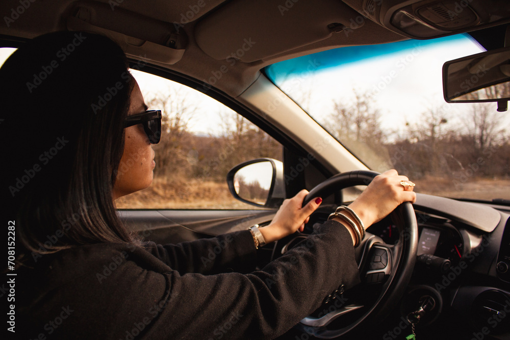 woman driving a car woman driving a car