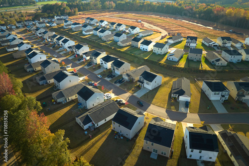 Aerial view of tightly packed homes in South Carolina residential area. New family houses as example of real estate development in american suburbs photo