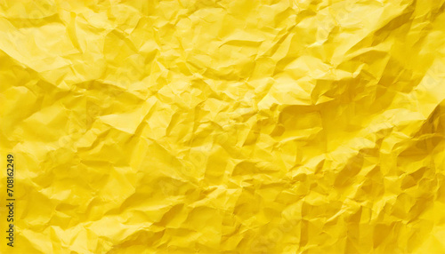 clean crumpled of yellow paper for abstract background and texture.