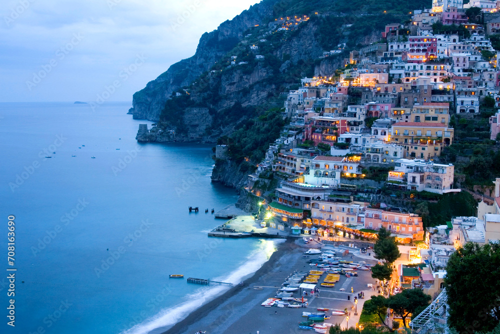 town view, townscape of Positano in evening twilight with beach and mediterranean sea, Amalfi Coast, Campania, Italy, Europe