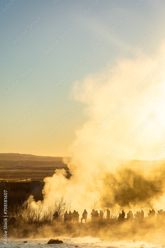 Stokkur geyser spectacular eruption in front of the sun , Iceland Stokkur geyser spectacular eruption in front of the sun , Iceland