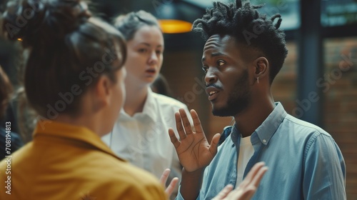 Group of young people talking together, deaf friends or students using hands to express their view, arguing in sign language, to ask a question, give an answer, give one's opinion, body language