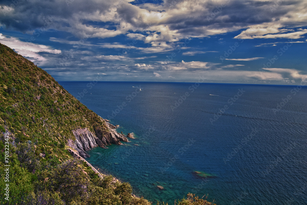 Cinque Terre Mediterranean Sea views along town hiking trail Italian Riviera coastline. Liguria, Italy, Europe. 2023 Summer.