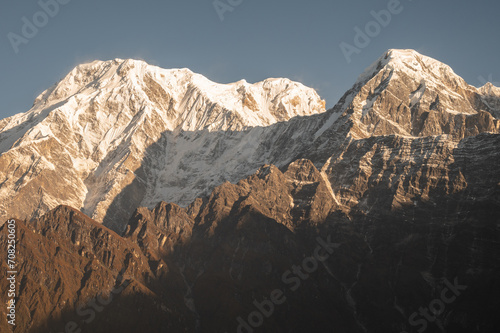 View of Mt.Annapurna South (7,219 m) and Mt.Hiunchuli (6,441 m) during sunrise seen from Mardi Himal view point in the Annapurna region of Nepal. 