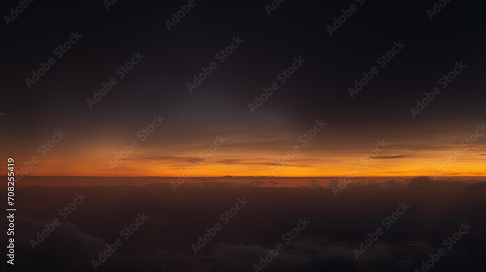 Bright orange sky and light of the sunrise at morning.