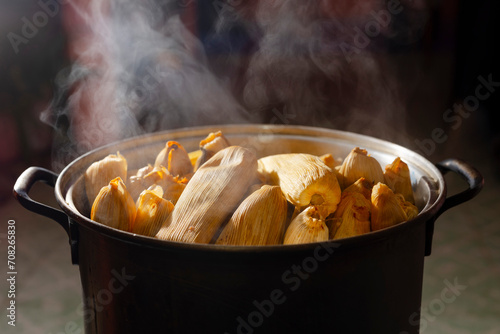 Hot corn tamales in a tamale steamer. Traditional mexican food	