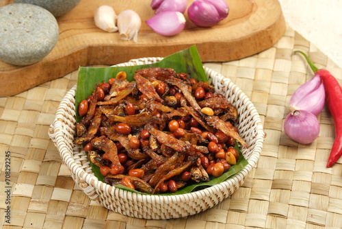 Sambal balado teri kacang is fried anchovy and peanuts with hot and spicy chili sauce.Traditional Indonesian food photo