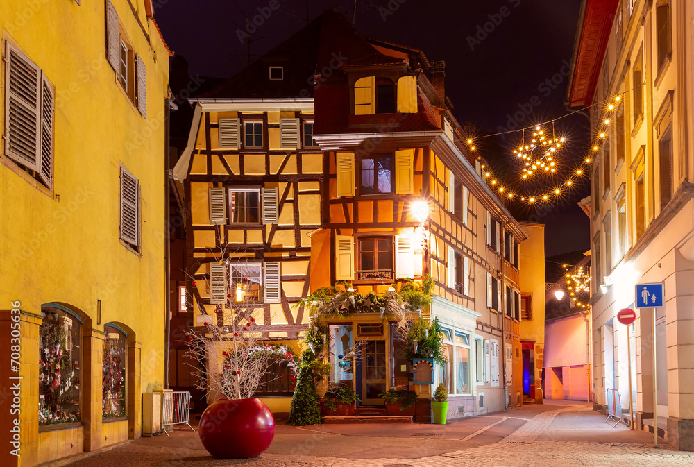 Naklejka premium Old town of Colmar, decorated and illuminated at Christmas time, Alsace, France