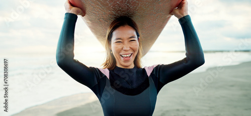 Happy, portrait and woman with surfing board at beach, sea and ocean on summer holiday, travel adventure and fun. Japanese surfer excited for water sports, freedom and hobby on tropical vacation