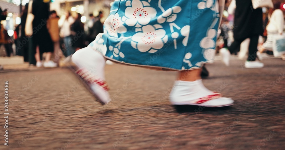 Japanese woman, feet and walking in kimono in city, journey and wellness for heritage on road. Person, blur or traditional clothes in tokyo street on holiday or sandals for travel in japan fashion