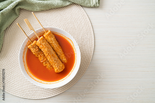 Omuk - Korean fish cake skewer in Korean spicy soup photo