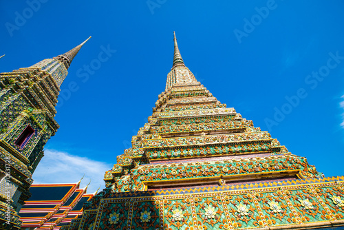 Buddhist pagoda temple sunshine day blue sky in Bangkok