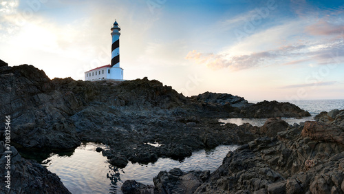 favaritx lighthouse signal boat minorca island sunset sunrise bay mediterranean sea color clouds
