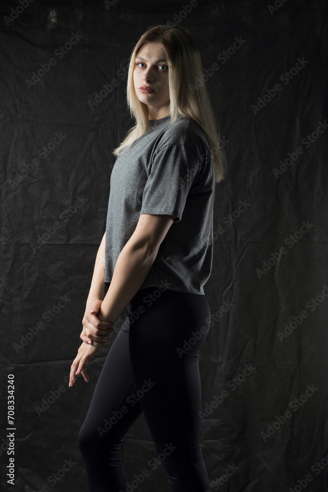 Portrait of a young beautiful girl working out in the gym. Portrait of a young beautiful girl working out in the gym.