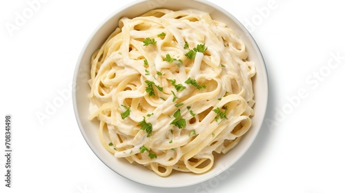Bowl of fettucini alfredo with garnish isolated on transparent background, top down view, view from above, delicious Italian pasta dish food for menu