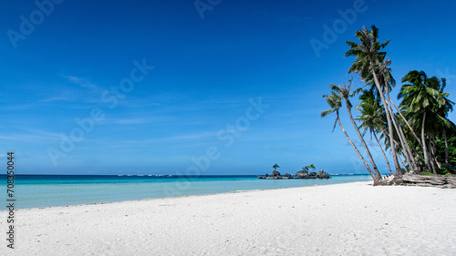 White beach and coconut trees on Boracay Island Philippines