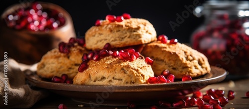 Freshly baked scones with whole-wheat and pomegranate. photo