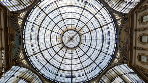 stained glass window of the dome in Galleria Vittorio Emanuele II shopping arcade in Milan city center Italy