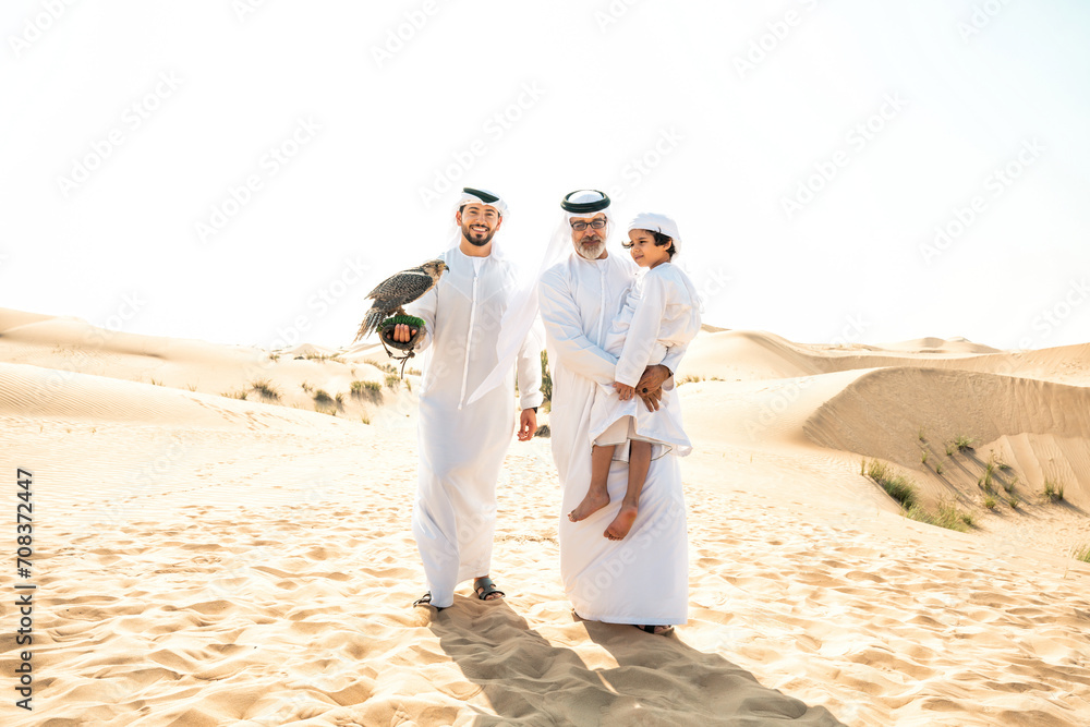 Naklejka premium Three generation family making a safari in the desert of Dubai