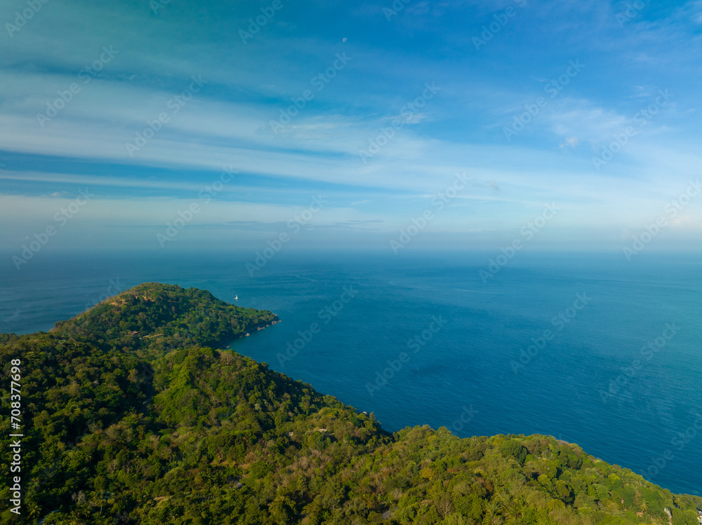 Aerial view seashore with mountains at Phuket Thailand, Beautiful seacoast view at open sea in summer season,Nature recovered Environment and Travel background