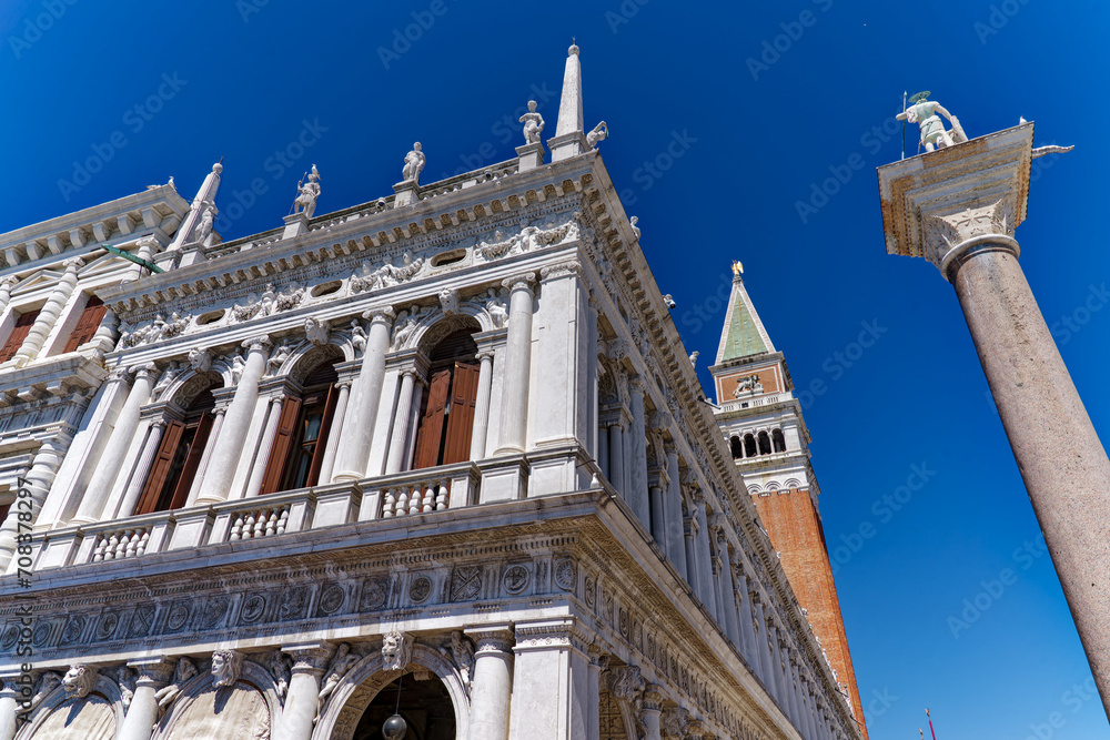 Old town of Italian City of Venice with library, church tower and Column of Saint Theodore on a sunny summer day. Photo taken August 7th, 2023, Venice, Italy.