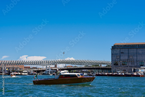 Old town of Italian City of Venice with passenger terminal at port on a sunny summer day. Photo taken August 7th, 2023, Venice, Italy.