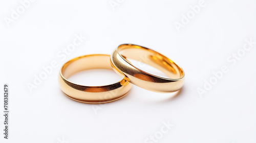 simple wedding rings on wedding card on a white background