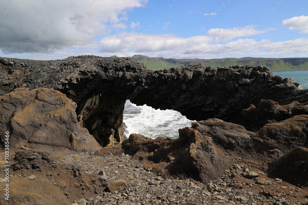 Rock gate Dyrholaey peninsula fantastic coastal landscape-Iceland Rock gate Dyrholaey peninsula fantastic coastal landscape-Iceland