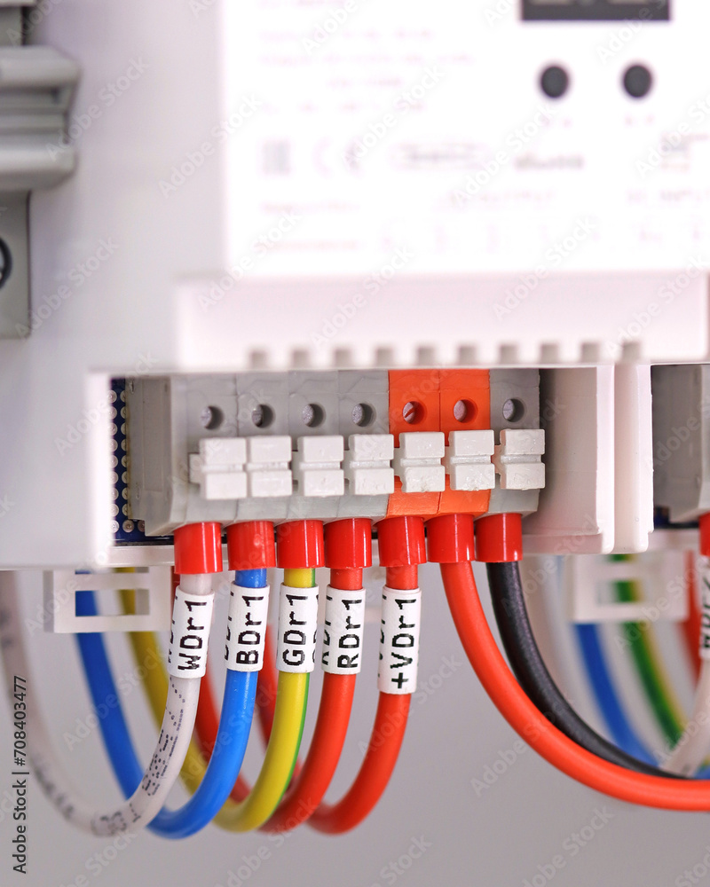 Connection of Led lighting control modules using stranded mounting wires. Marking on nylon tape.
