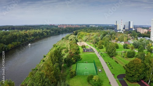 Green park along the river. Bird eye view of beautiful park near Moskva river canal in Dolgoprudny city, Russia photo