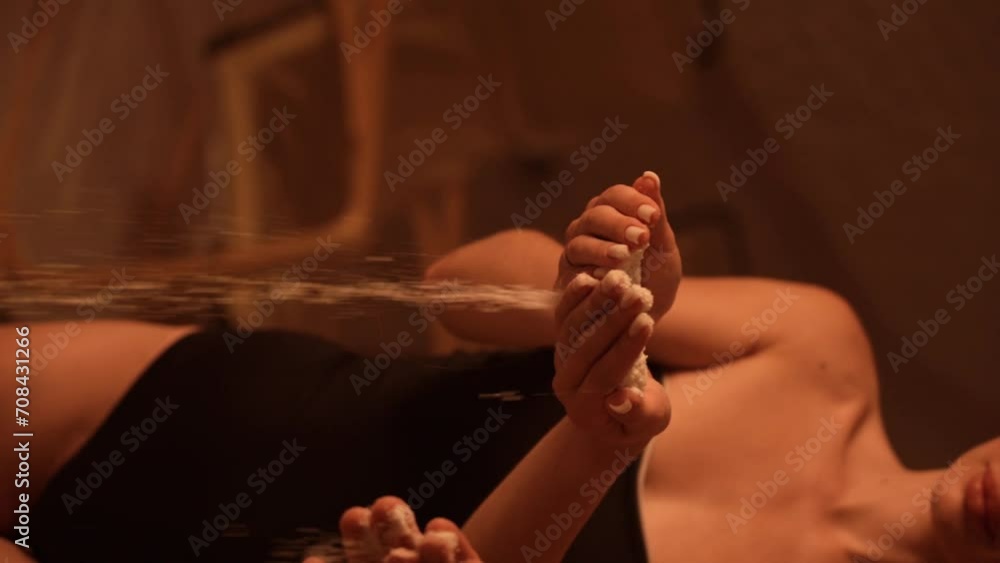 A young man and woman relax in the salt room. Wellness holiday concept. Vertical video A young man and woman relax in the salt room. Wellness holiday concept. Vertical video