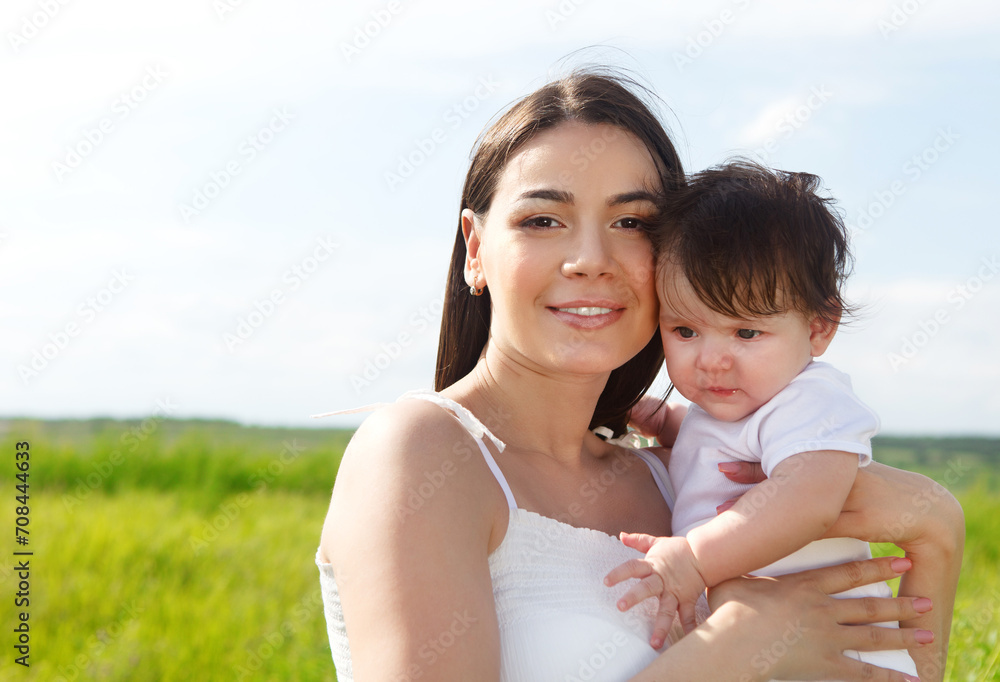 Happy mother and her little daughter