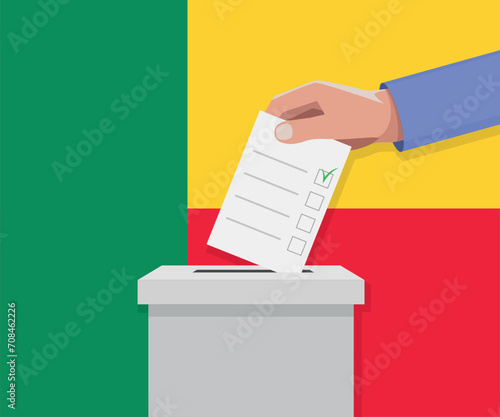 Benin election concept. Hand puts vote bulletin