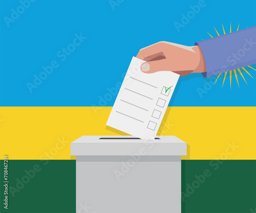 Rwanda election concept. Hand puts vote bulletin