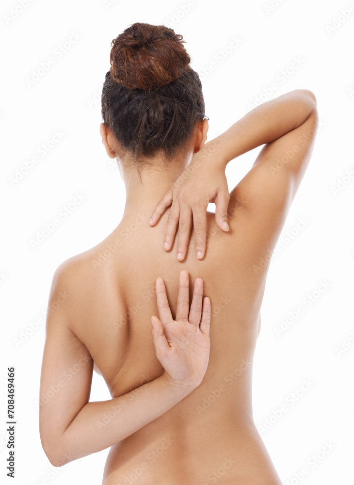 Woman, back and naked in studio for body care, skincare and self love or treatment by white background. Female person, nude and wellness or cosmetics and dermatology, beauty and luxury grooming