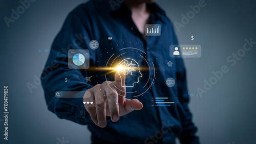 Quadro em tela A businessman employs an internet chat bot to exchange and analyse consumer data