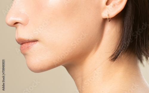 40代日本人女性の顔のクローズアップ/鼻、口、顎、首 photo