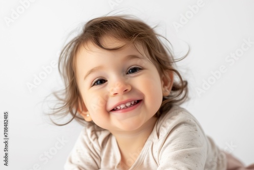 Radiantly Happy Toddler Striking a Playful Pose, Isolated on a Clean White Background, Perfect for Capturing the Innocence and Joy of Childhood