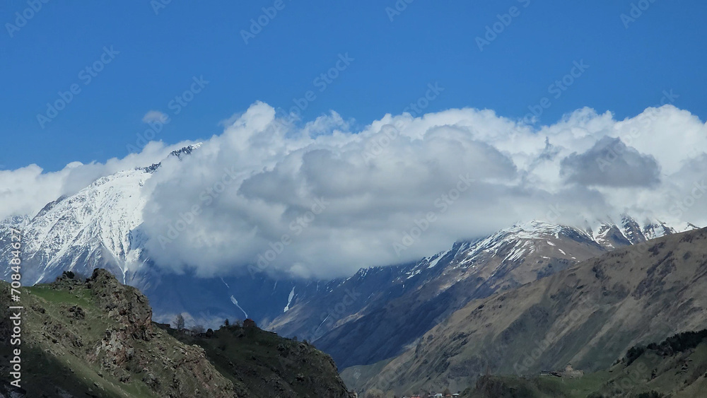 A breathtaking view of Gudauri’s snow-capped mountains in Georgia, featuring icy peaks and pristine landscapes. Perfect for winter, travel, and nature-themed projects. A breathtaking view of Gudauri’s snow-capped mountains in Georgia, featuring icy peaks and pristine landscapes. Perfect for winter, travel, and nature-themed projects.