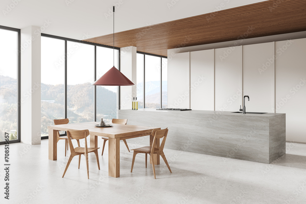 Fototapeta premium Stylish home kitchen interior with bar counter and eating zone, panoramic window