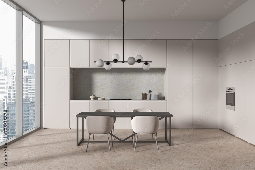 Fototapeta premium Beige kitchen interior with dining table