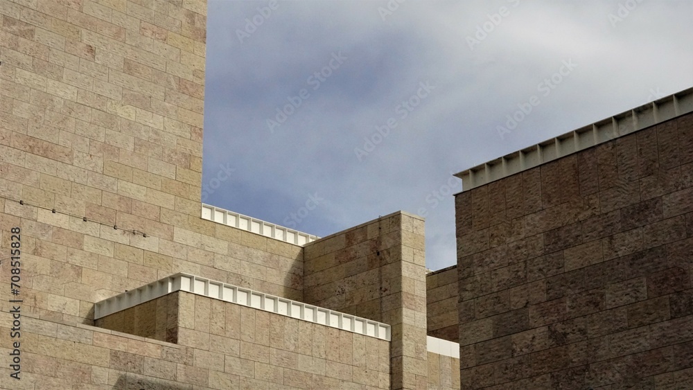 modern facade of geometric forms against the sky modern facade of geometric forms against the sky