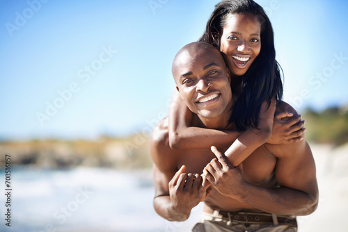Happy couple, smile and piggyback with portrait, beach and married for summer vacation. African, enjoying and excited for holiday, fun and seaside in outdoor, beautiful and day off in costal city