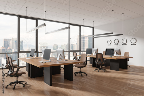 Photography Modern office interior with pc monitors, world clock and panoramic window