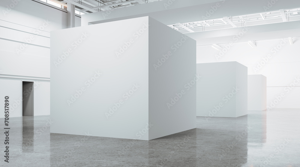 Open space large gallery interior with blank white boxes on concrete floor - obrazy, fototapety, plakaty 
