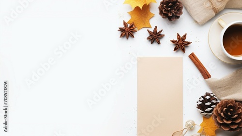 Stylish Workspace Composition with Coffee Break Essentials on a Grey Background - Modern Office Supplies and Seasonal Decor for Cozy Business Atmosphere © Pasinee
